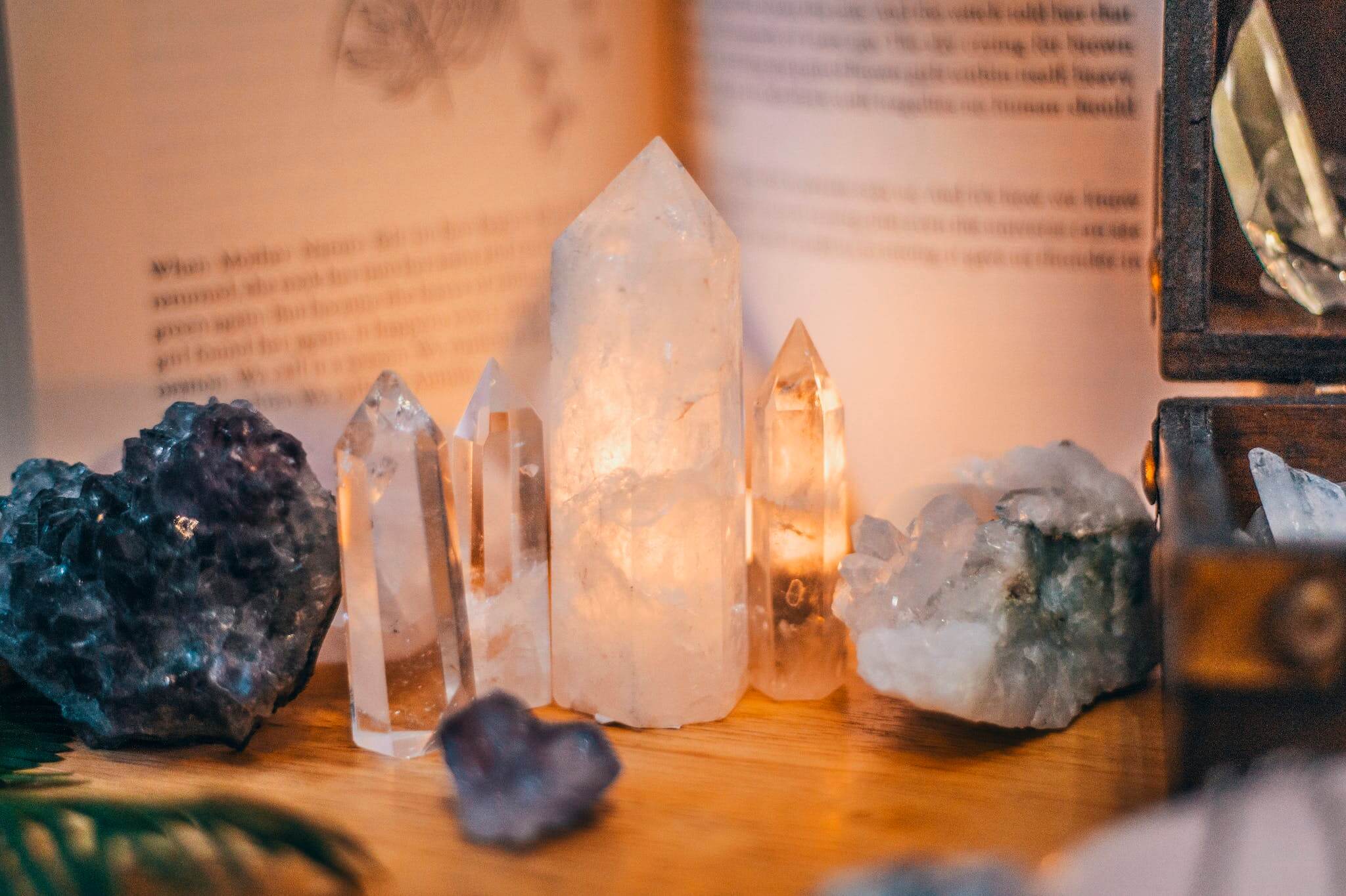 Crystals and Stones on Brown Wooden Table